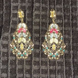 Jeweled statement earrings.